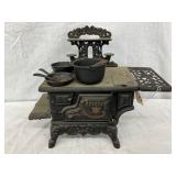 Cast Iron Crescent Toy Stove with Accessories, 14in by 10in