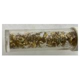 Tube Containing Gold Flakes