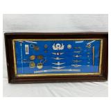 Framed Set of 29 North American Airline Metal Items