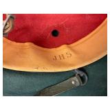 Marked with ‘JHS’ inside the leather liner. 