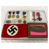 12 WWII German Medals, Badges, and Textile Items