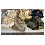 Early WW2 Military Items Including Gas Mask, Uniforms, and Cloth Storage Bags