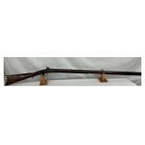 Early Black Powder Rifle with Octagonal Barrel and Wooden Stock