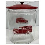 Gordon’s Glass Cracker Jar with Original Red Metal Lid and Truck Graphics