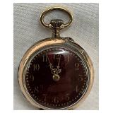 Swiss-Made Open-Face Pocket Watch With Ornate Back Engraving And Visible Movement