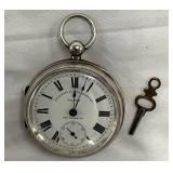 Silver-Colored Manual Wind Pocket Watch with Key, Roman Numerals, and Engraved Case