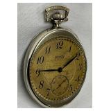 “17 Jewels Adjusted,” and bears serial number 25082500