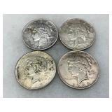 Four Peace Silver Dollars: Two 1925 and Two 1923