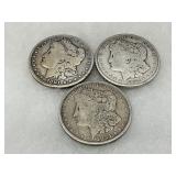 Three 1881 and Two 1921 Morgan Silver Dollars