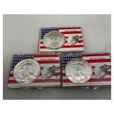 Three American Eagle Silver Dollars (1993, 1995, 1997) in Original Cases
