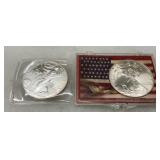 Two Uncirculated American Silver Eagles, 2000 and 2003