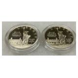 Two 1986 Ellis Island Silver Dollar Proof Coins in Capsules