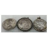 Three Silver Dollars: 1922 & 1926 Peace Dollar Pendants and 1899 Morgan Dollar in Ornate Bezel