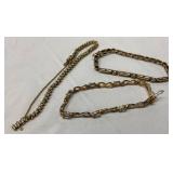 Three 10k Gold Bracelets Featuring Link and Infinity Designs