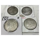 Four Morgan Silver Dollars: 1879-O, 1921, 1921-D, and 1921-S