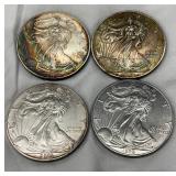 Four American Silver Eagle Coins, 2001 and 2010