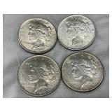 Four 1922 and 1924 Silver U.S. Peace Dollars