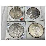 Four 1925 and 1935-S Peace Silver Dollars in Paper Holders