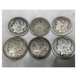 Six Morgan Silver Dollars, 1880s-1920s