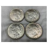 Four 1923 Peace Silver Dollars