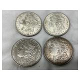Four Morgan Silver Dollars, 1882, 1884, 1891, and 1921