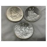 Three One Troy Ounce Silver Rounds Featuring Various Designs