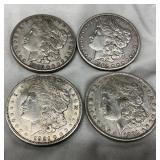 Four Morgan Silver Dollars, Various Years (1886, 1902, 1921, 1881)