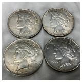 Four United States Peace Silver Dollars (1922, 1923, 1934, 1935)