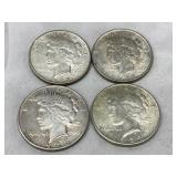Four U.S. Peace Silver Dollars (1922, 1924, 1935)