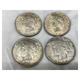 Four 1922 U.S. Peace Silver Dollars