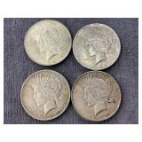 Four U.S. Peace Silver Dollars, 1922 & 1934
