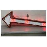 Large DS Arrow Sign with Blinking Yellow and Red Lights