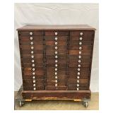 42-Drawer Cabinet with Porcelain Knobs on Casters