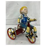 Early Tin Windup Boy on Tricycle toy