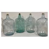 Four Glass Water Jugs with Cork Stoppers