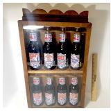 Collection of Richard Petty Pepsi Bottles in Wooden Display Case