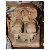 Stone carved pioneer wagon