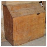 Wood pine bin with cowboy brand markings