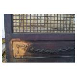 Swag detailing on oak screen door