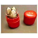 Utensils in leather and glass holder