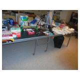 Folding Ping Pong table displayin g vintage cameras, etc.