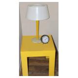 Retro yellow table and lamp, clock