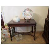 Side table, books, porcelain