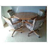 Kitchen Table with Four Captains Chairs