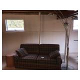 73 Inch Sleeper Sofa, Carpet, Table, and Lamp