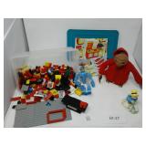 Legos, E.T. Doll, and Paddington Golf Figurine