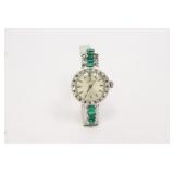 18k Omega watch with emeralds and diamonds