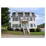 Apartment Building Sold to the Highest Bidder