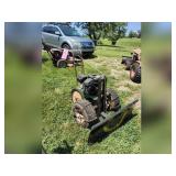 Homemade self propelled snow pusher, has predator gas pwr 212cc motor, drive axle has chains,