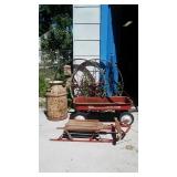 antique milk can, radio flyer wagon & sled
